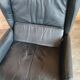 Club armchair in leather by the brand Roset.