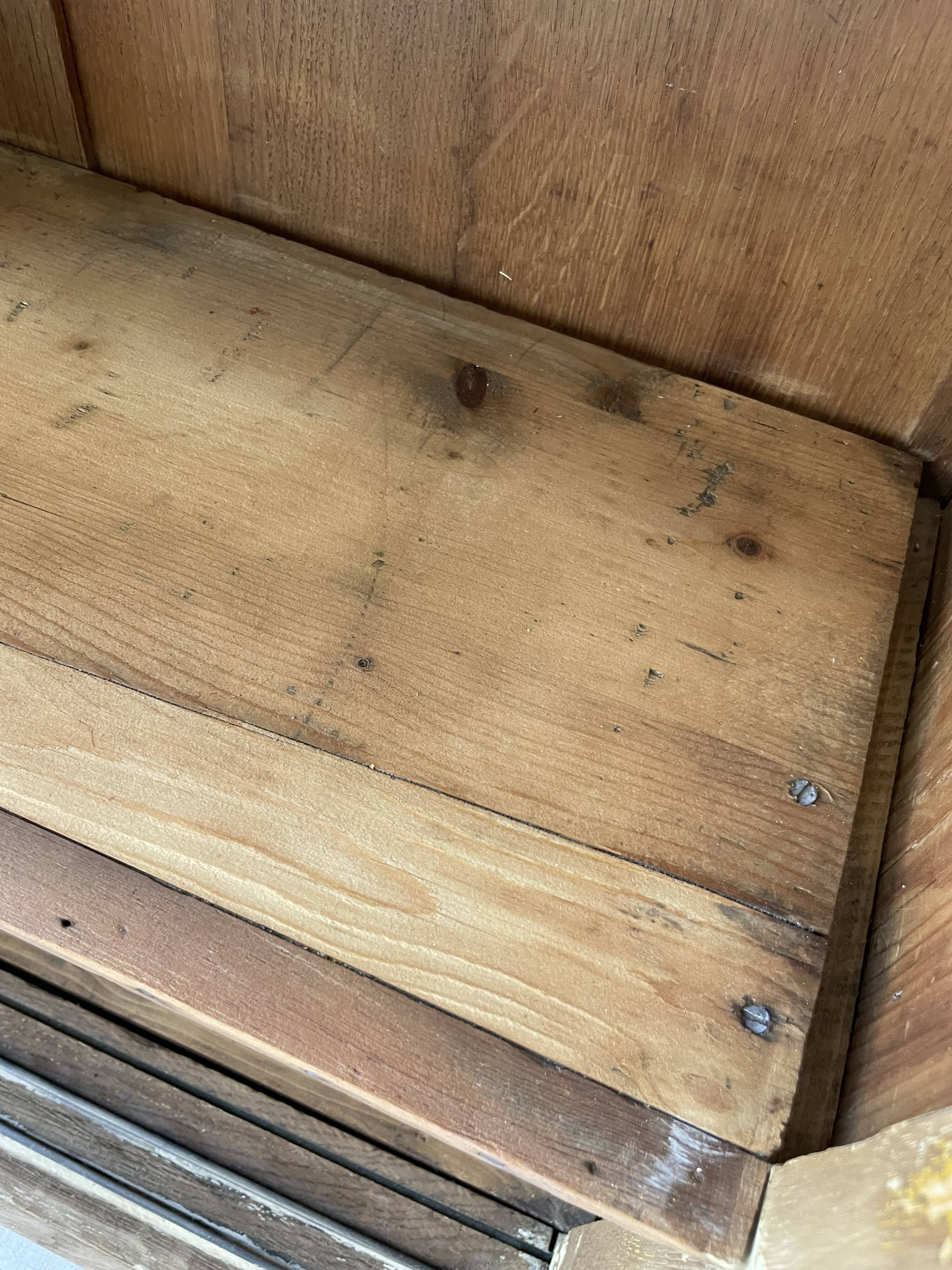 Large row of solid oak loom sliding doors