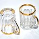 Baccarat set of 2 glasses with liquor mug in gilded cut crystal 1907 4.5cm