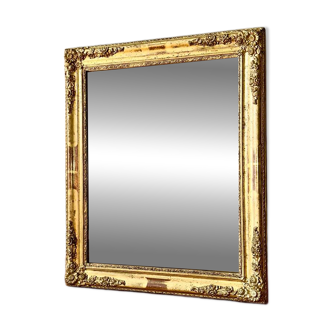 Antique gilded mirror from the early 19th century.