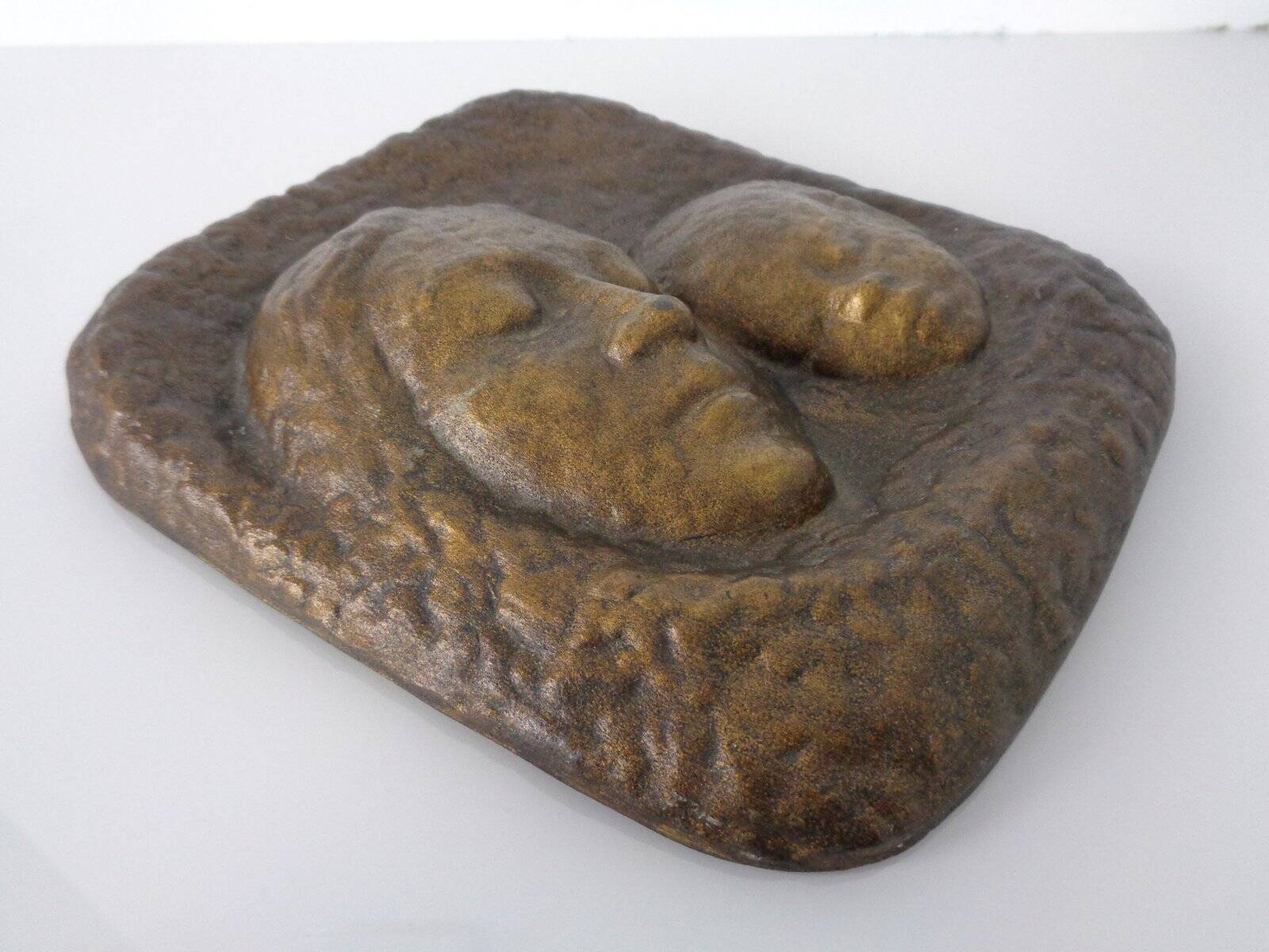 German bronze relief of mother with baby, 1940s.