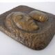 German bronze relief of mother with baby, 1940s.