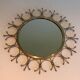 Sun mirror in brass and brushed steel