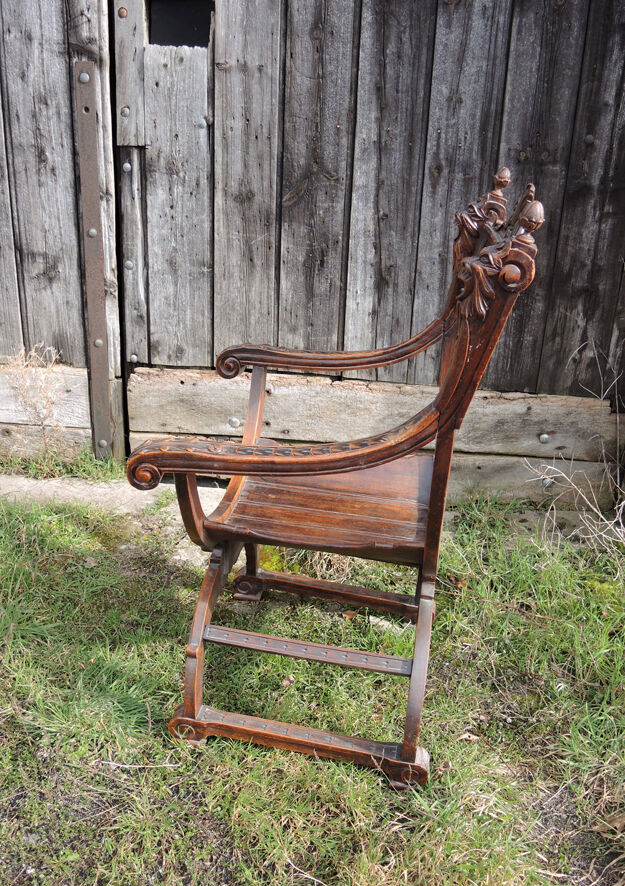 Former curulle chair says dagobert carved wood