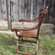 Former curulle chair says dagobert carved wood