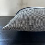 Woven striped cushion