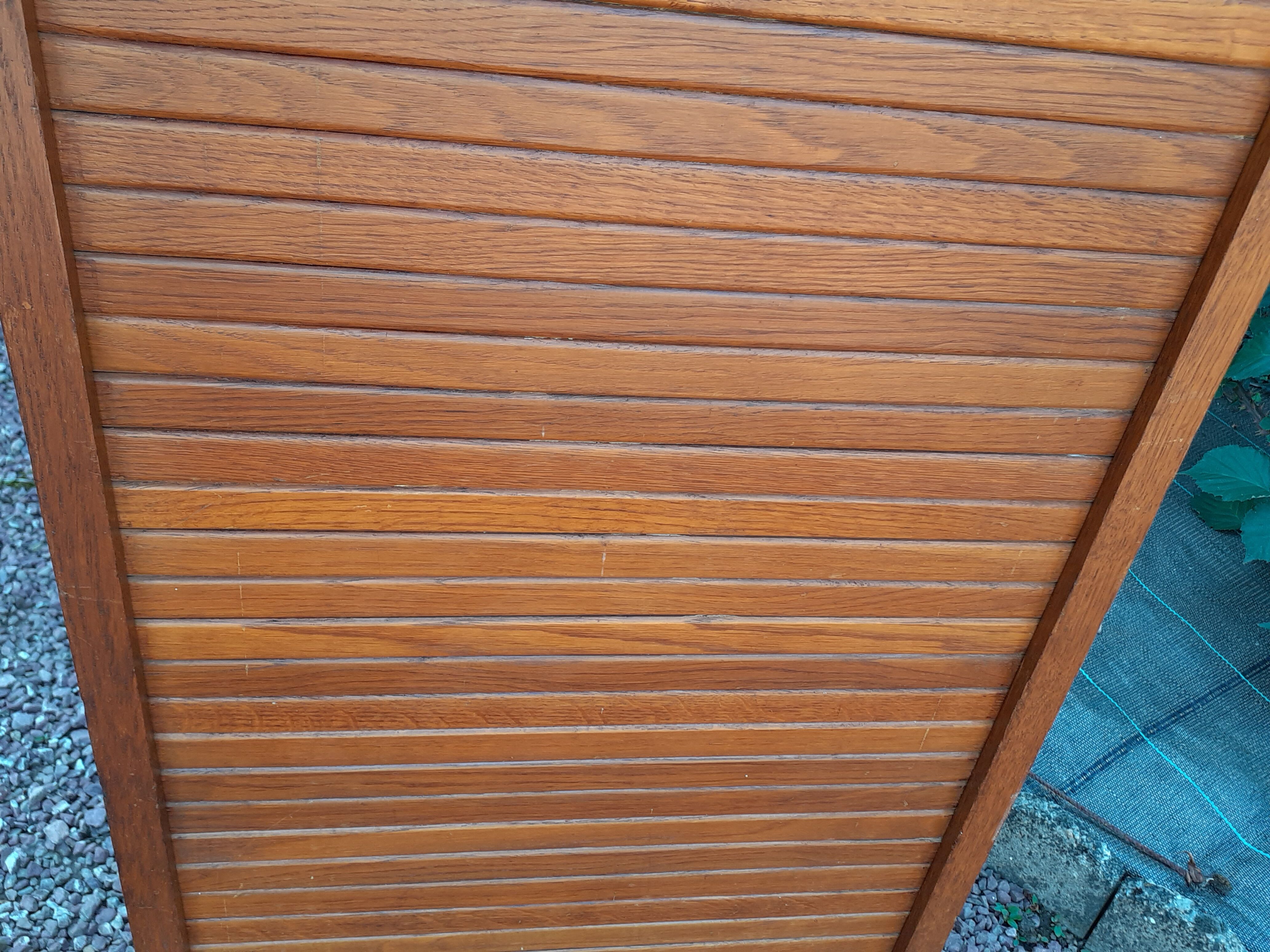 Storage cabinet locker with old wooden curtain