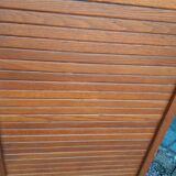 Storage cabinet locker with old wooden curtain