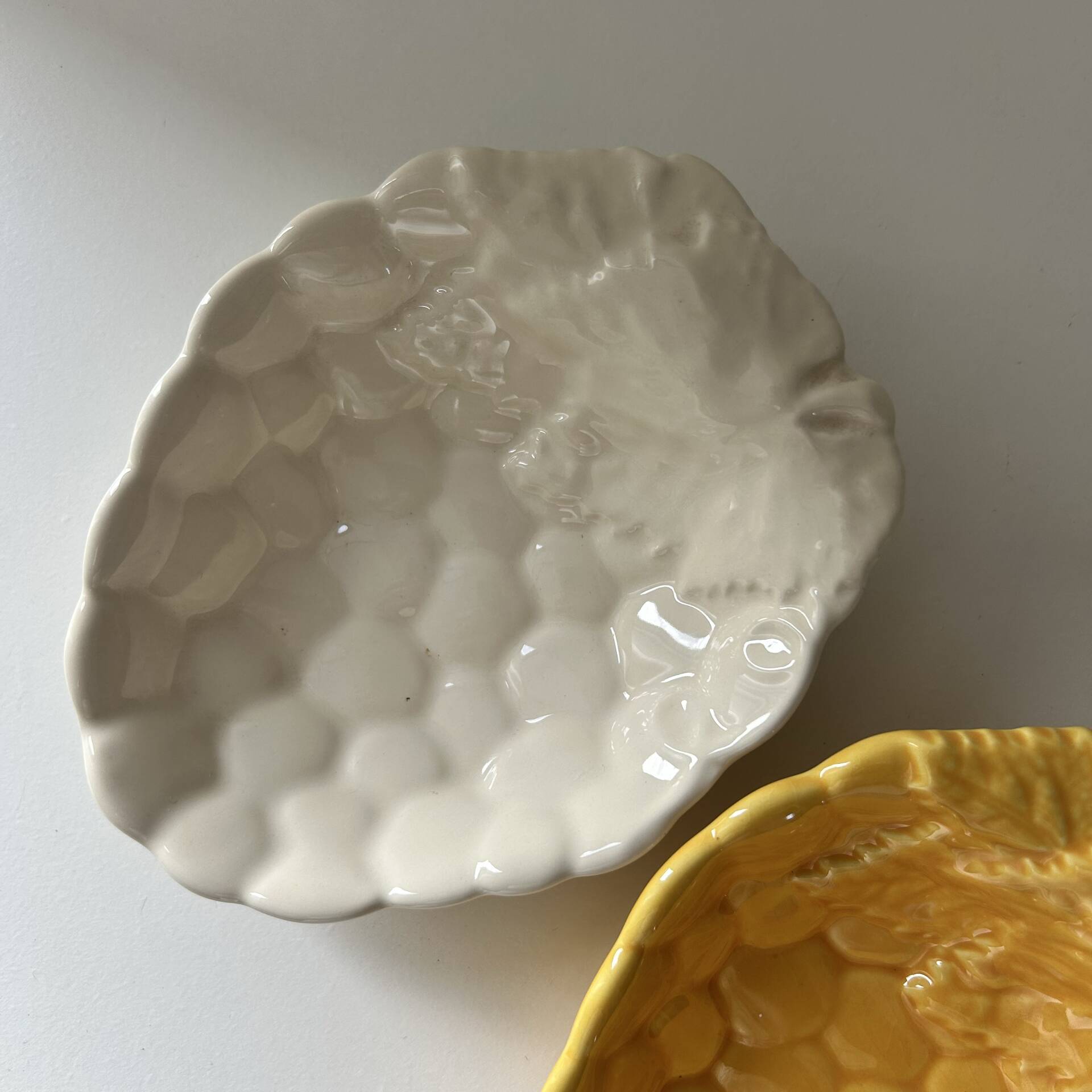 2 grape bowls in slipware