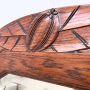 Art Deco oak mirror with carved motif