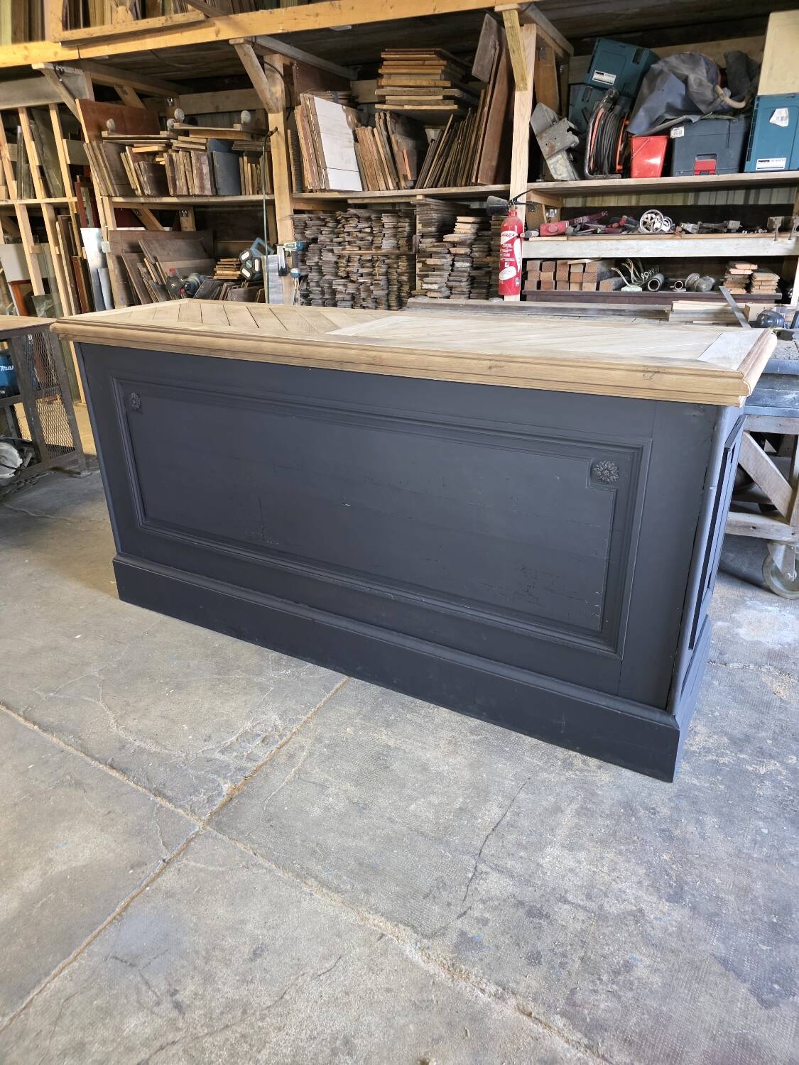 Chevron-patterned oak workbench