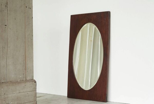 Miroir ovale facetté cadre rectangulaire chêne années 1920
