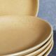 Five vintage natural stoneware soup plates