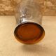 Antique clear blown glass pitcher + orange handle & foot vintage