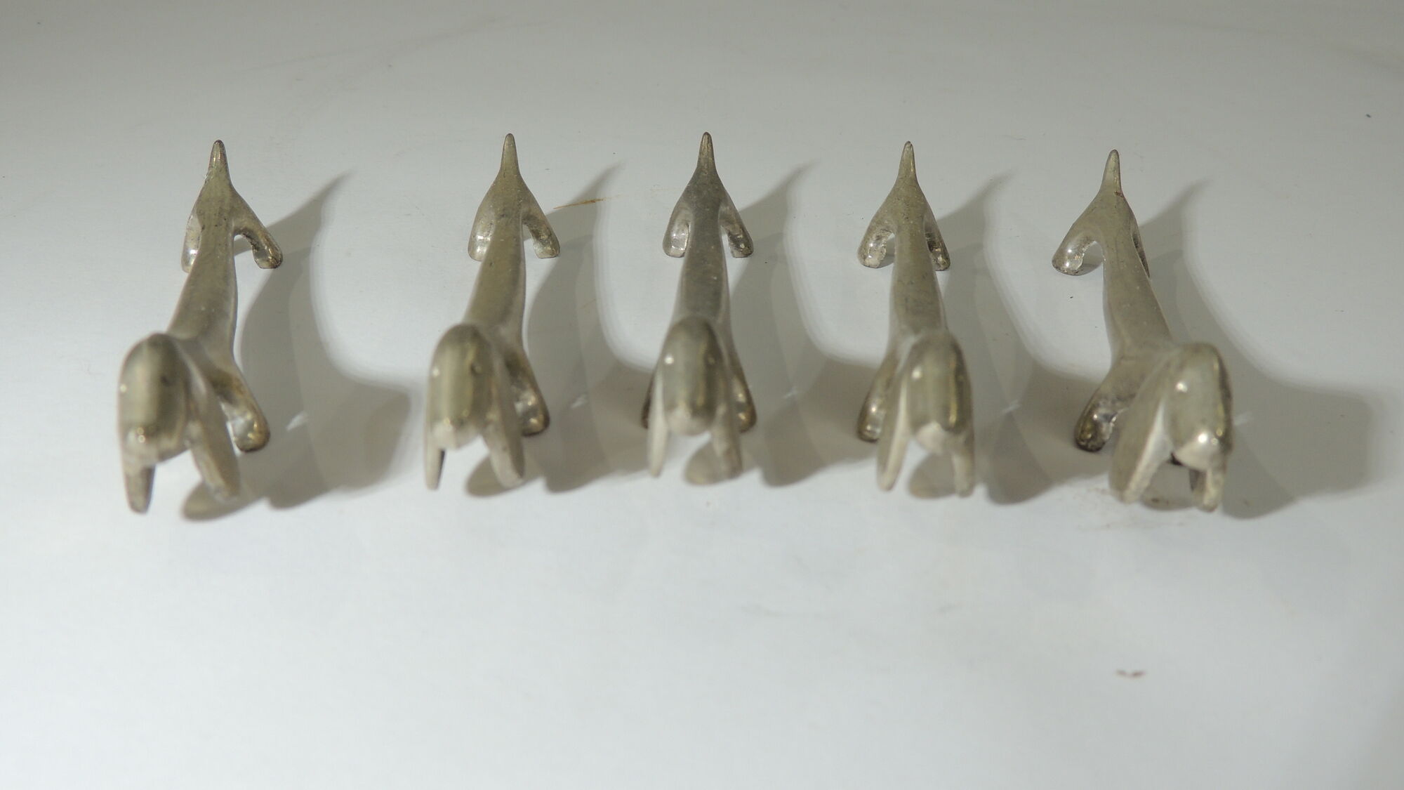 Lot 17 porte couteaux métal /chien /cheveaux/vintage