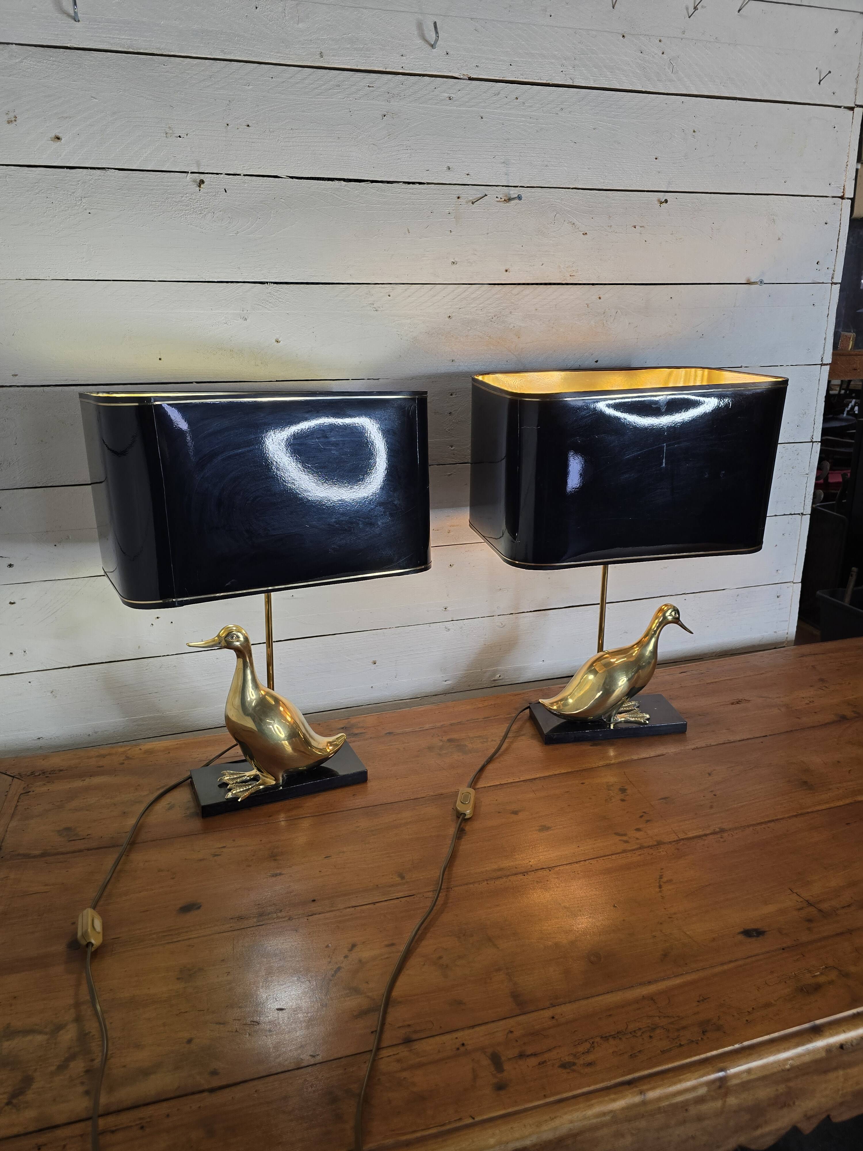 Pair of 70s table lamps featuring a brass duck