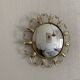 Vintage 1960s witch's eye sun mirror, domed gold metal - 45 cm