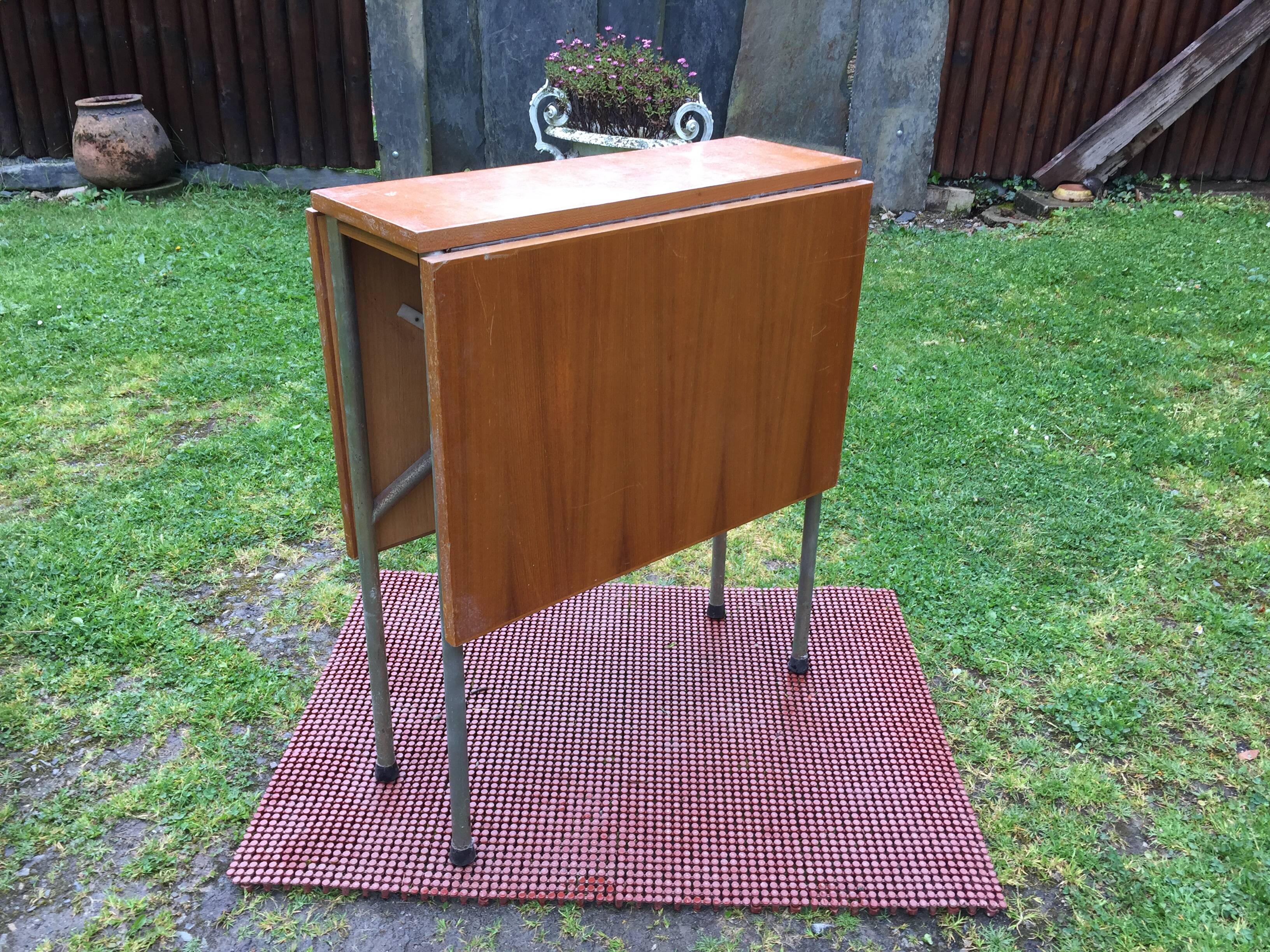 Vintage folding table with teak flaps said wallet with metal tubular base