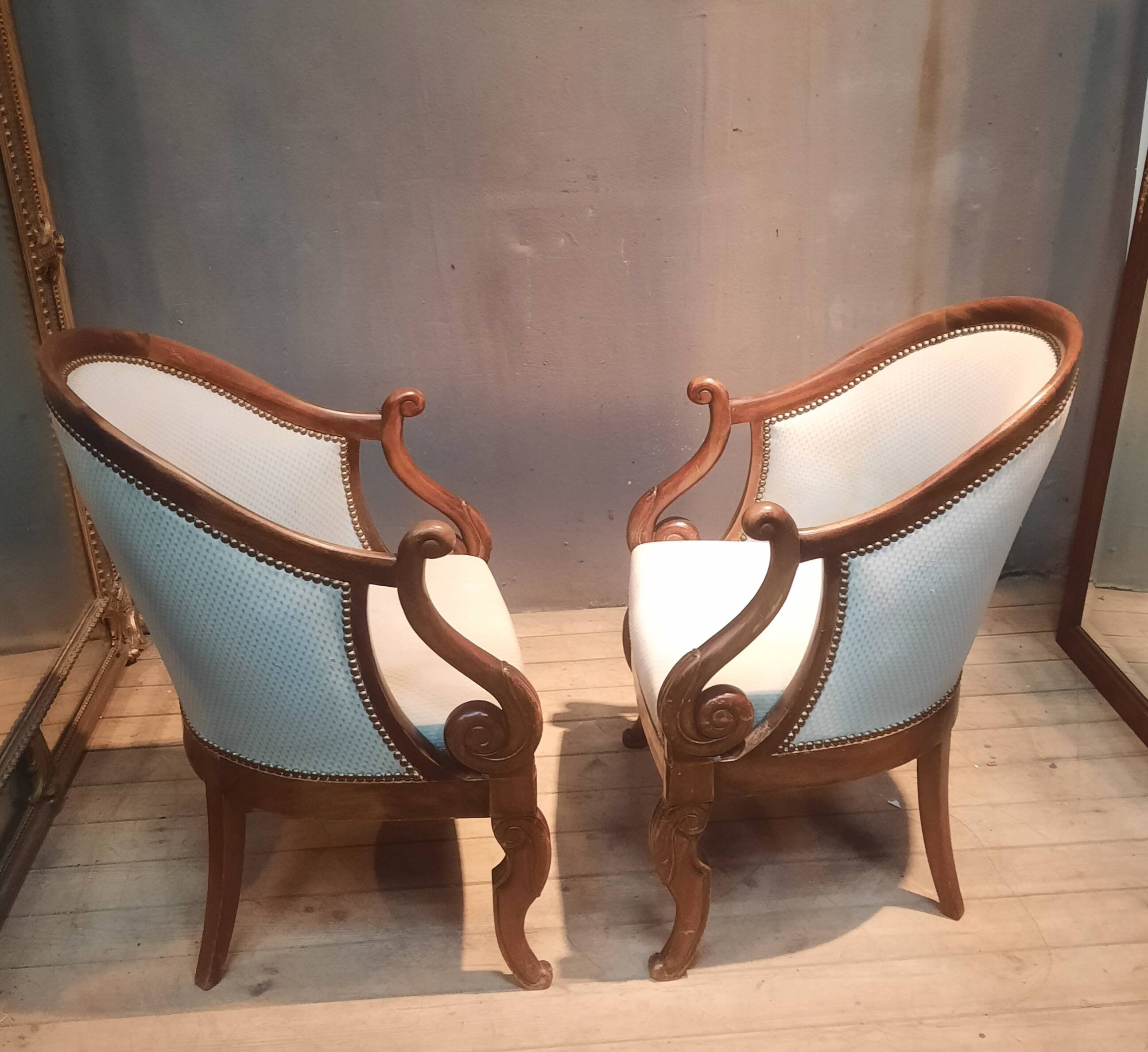 Pair of swan neck gondola armchairs