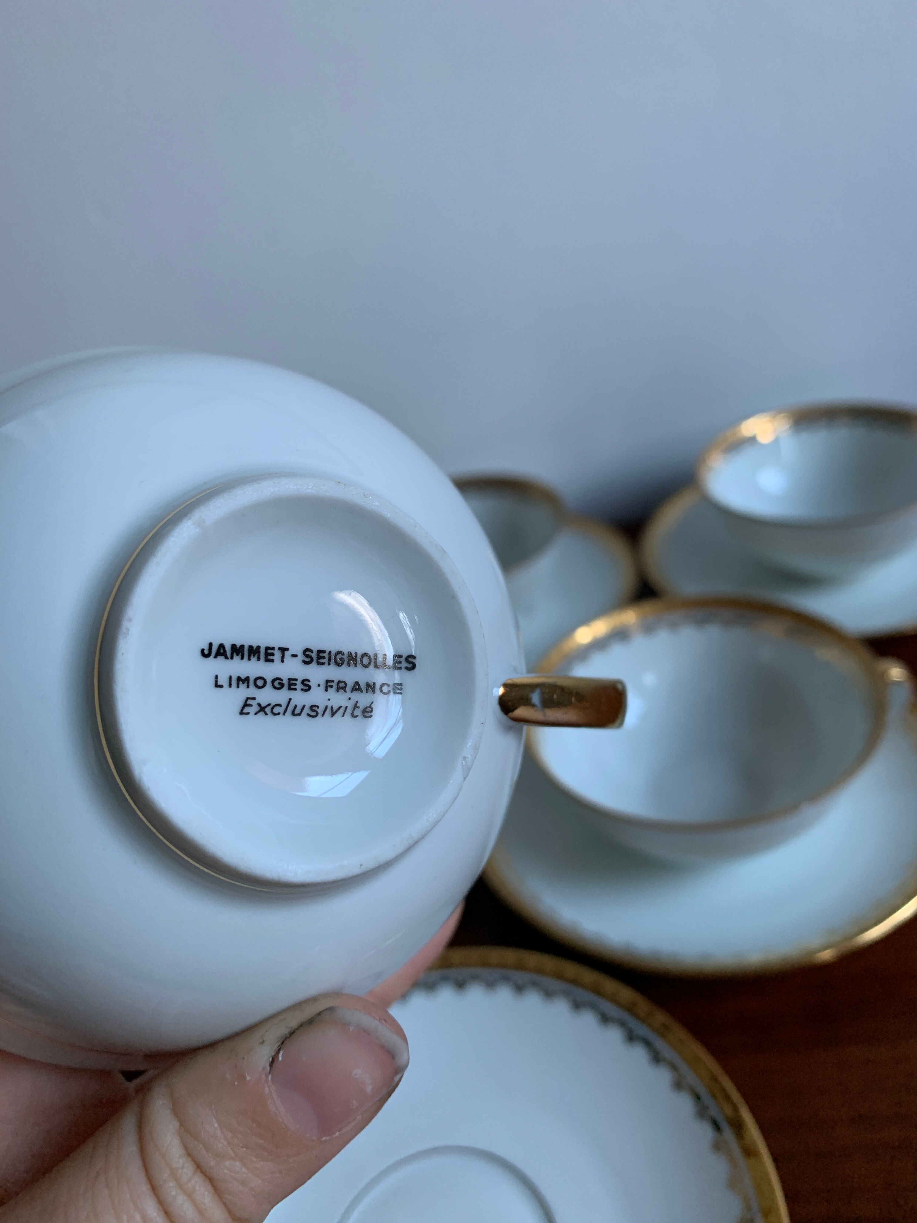 6 cups and golden porcelain saucers