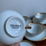 6 cups and golden porcelain saucers