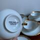 6 cups and golden porcelain saucers