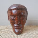 Wooden sculpture ethnic man's head handcrafted tribal decorative object workshop