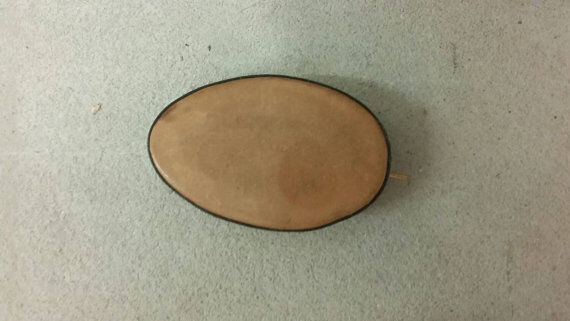 Copper candlestick and leather