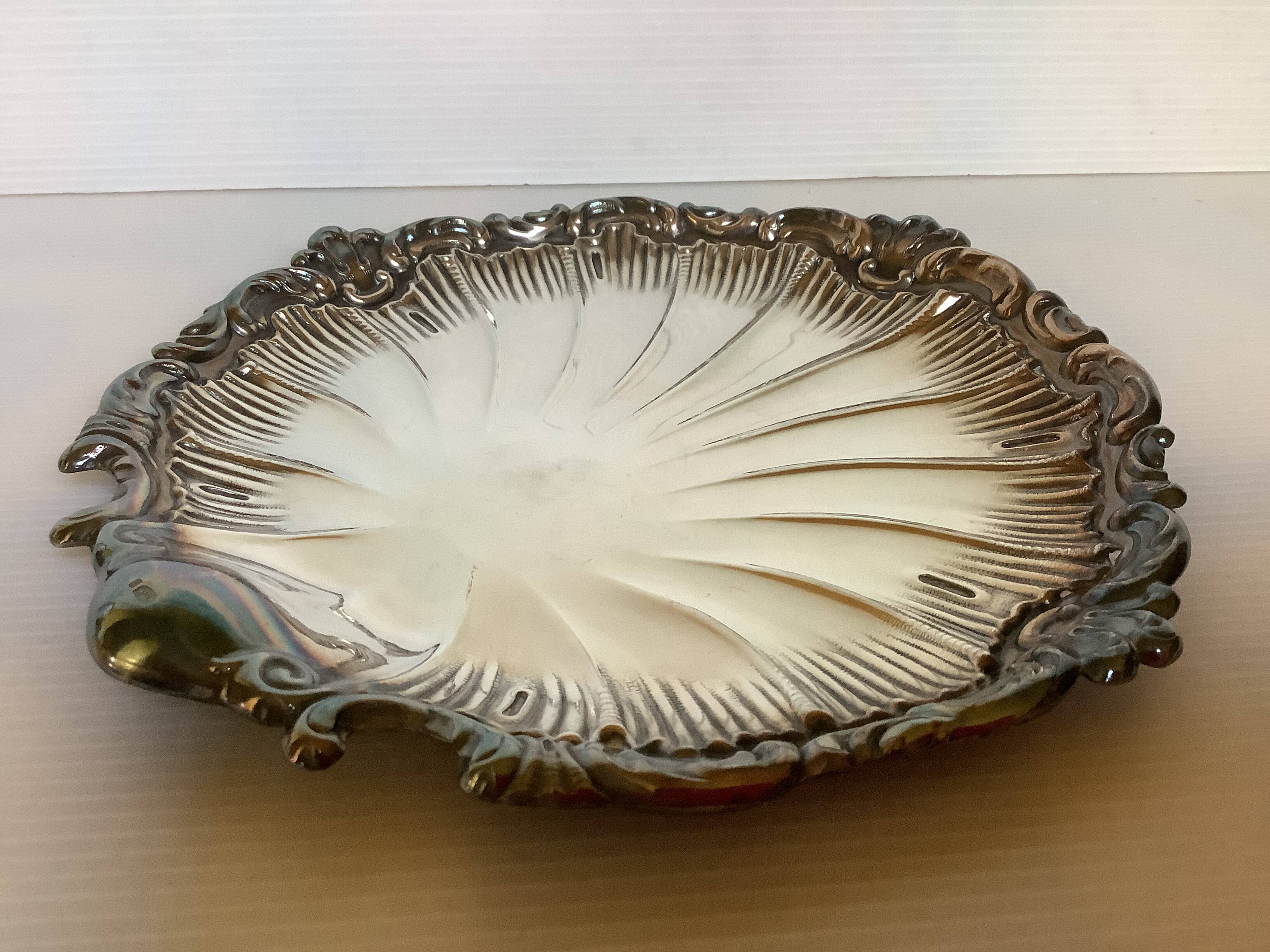 Empty shell pocket Oscar Wiskemann goldsmith