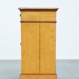 Antique wooden 1-door hallway/nightstand with a light marble top