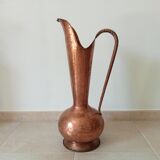 Old italian amphora vase in hammered copper