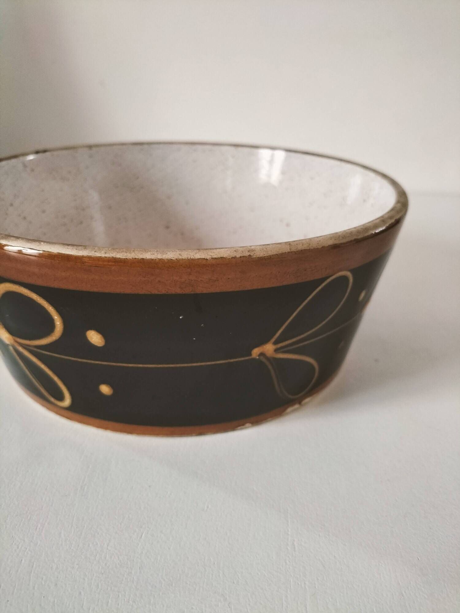 Vintage dish with black and ochre decoration and a speckled crackled interior – 1970s