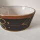 Vintage dish with black and ochre decoration and a speckled crackled interior – 1970s