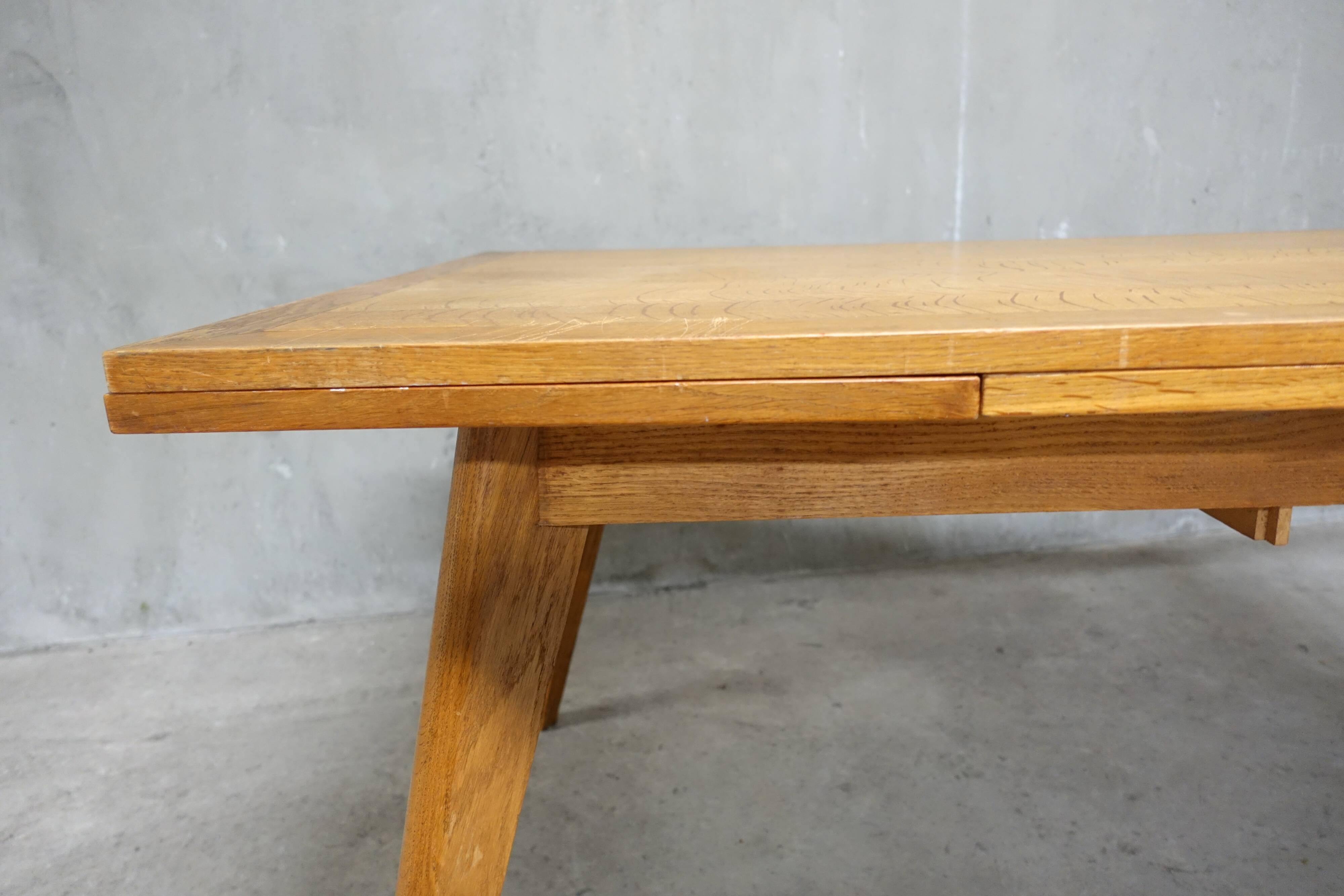 Dining table in blond oak compass feet 1950