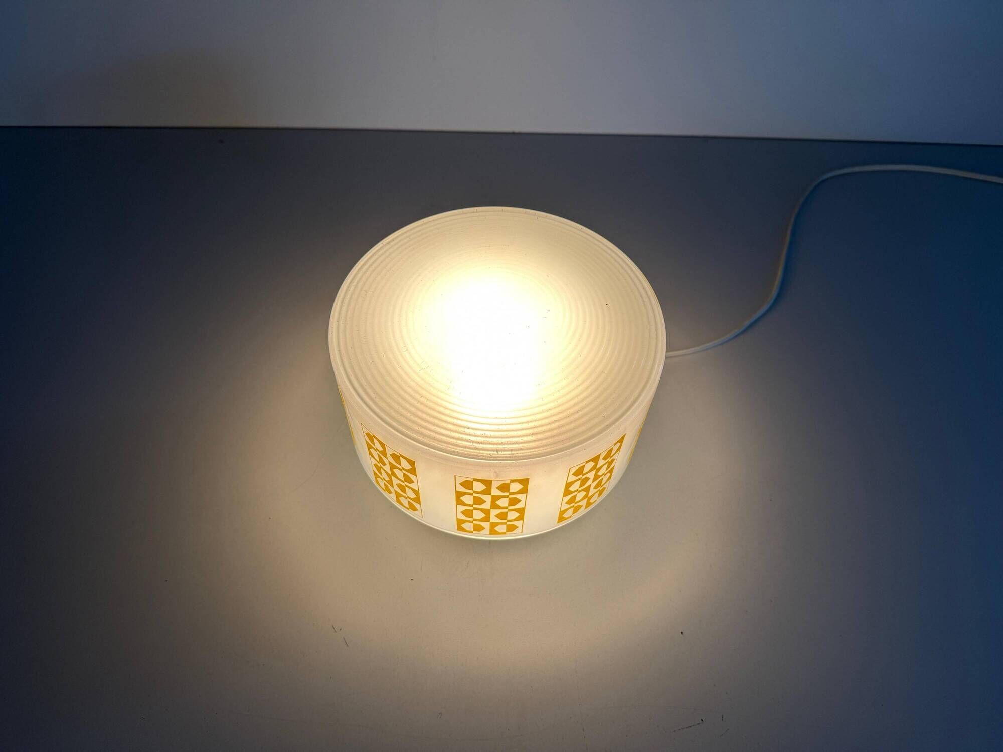 Ceiling light or wall sconce in opal glass with yellow decorations by VEB, 1950s, Germany.