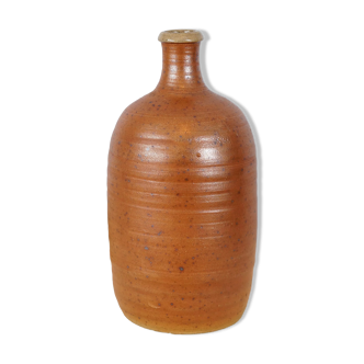 Bottle of vintage stoneware corsican brandy