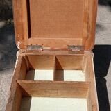 Shoe polish stool with round top and aluminum legs.