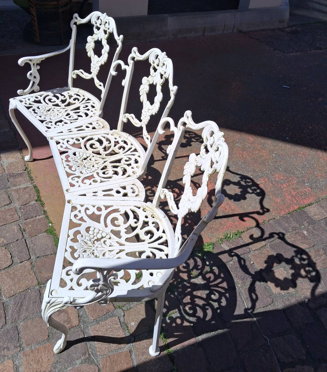 Large terrace or garden bench, made of cast iron, vintage decor.