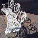 Large terrace or garden bench, made of cast iron, vintage decor.