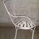Fauteuil de jardin fer forgé à lames flexibles rivetées début XXè