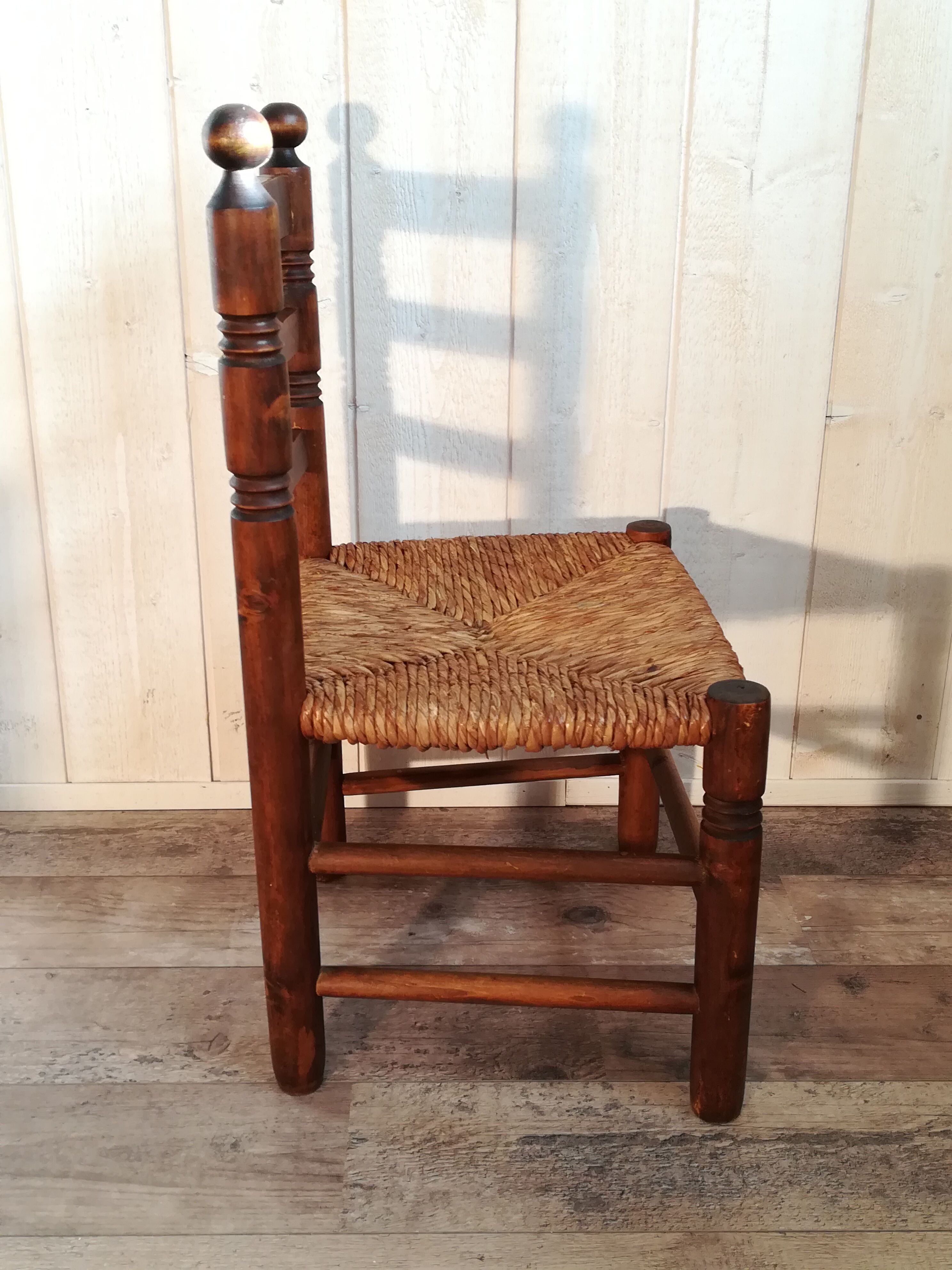 Wooden chair and straw