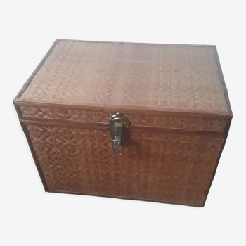 Wooden trunk with braiding