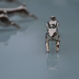 12 silver-plated metal "rabbit" knife rests