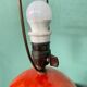 Lampe en céramique HAK Herman Kähler Art Déco, vers 1930, globe orange avec détails en laiton.