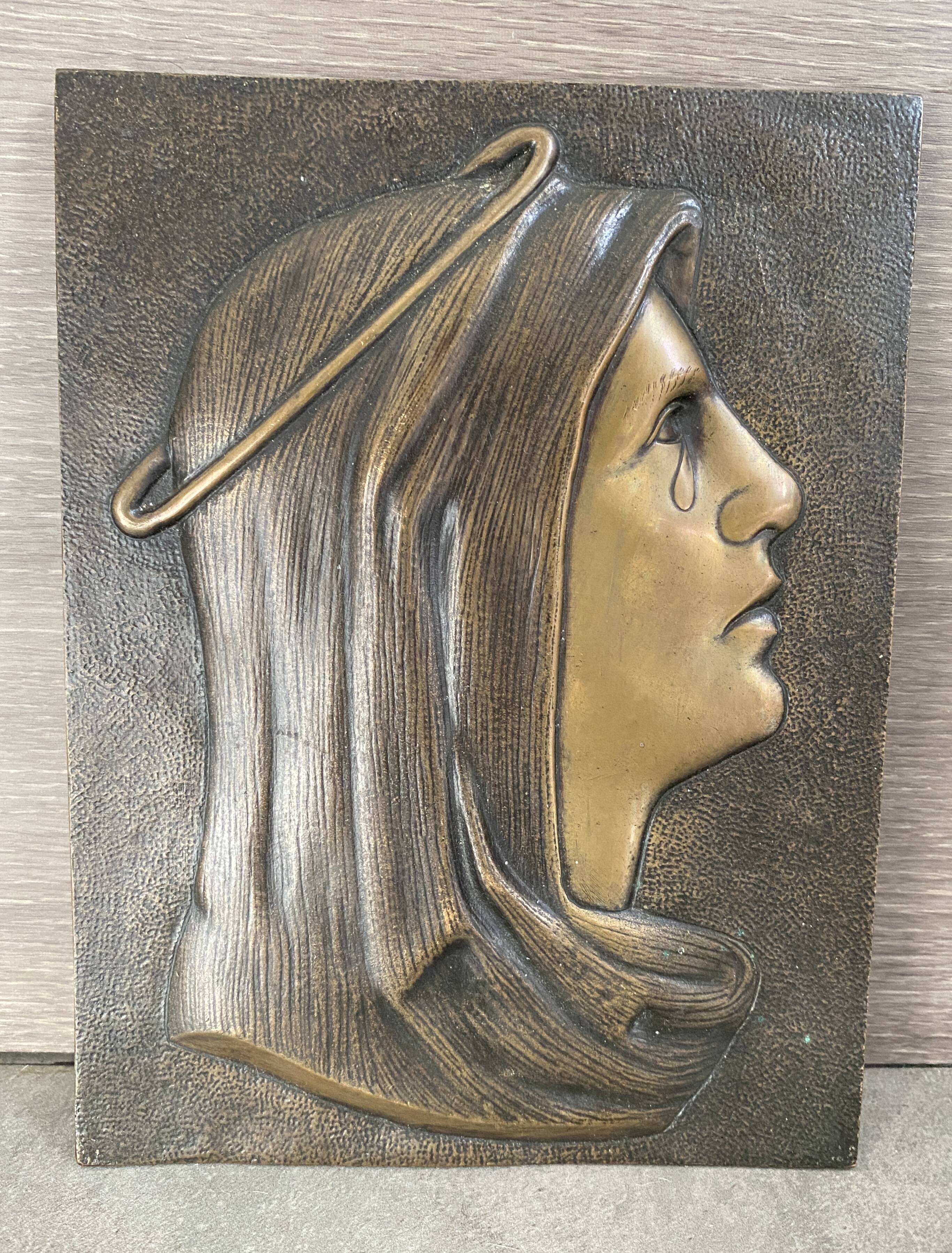 Bronze bas-relief of the Virgin