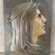 Bronze bas-relief of the Virgin