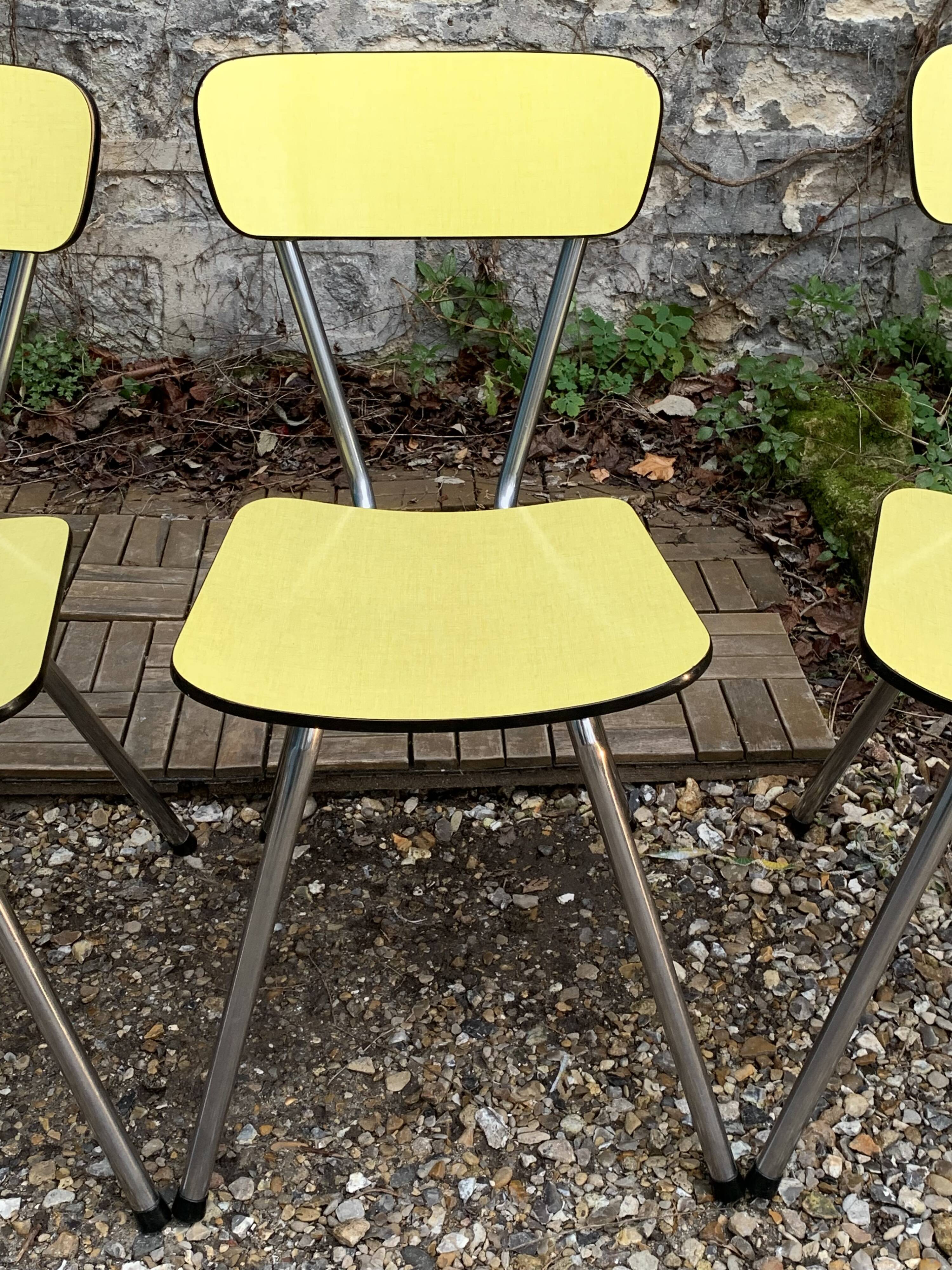 Yellow Formica chairs with compass legs, 1950s