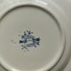 Assiette en terre de fer Longchamp