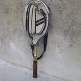 Racket with its vintage cover
