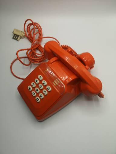 Vintage bakelite orange phone
